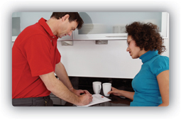 Powerflush technician and customer